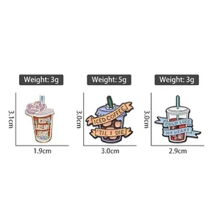 Three creative enamel iced coffee pins with heart slogans on a white background