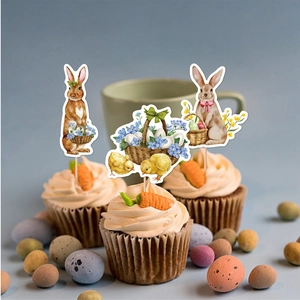 Easter bunny cupcake toppers with wooden picks shown on decorated carrot muffins