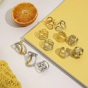 Minimalist stainless steel open rings in gold and silver with various textured patterns