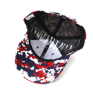Detail view of cotton pixel camo baseball cap interior with 100% cotton label
