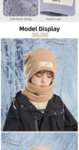 Detailed view of cozy beige winter hat with warm fleece lining and sport badge