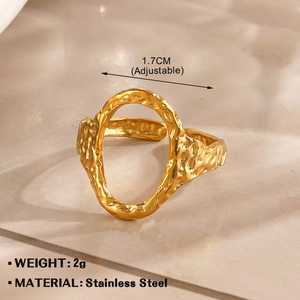 Macro shot of gold-plated stainless steel adjustable ring with hammered texture detail