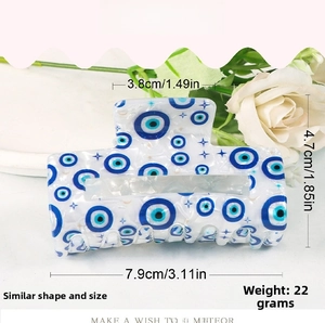 Detailed view of evil eye hair claw clip showing dimensions 7.9cm length and 4.7cm height