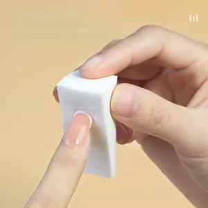 Macro shot of high-density white nail sponge for creating gradient manicure effects
