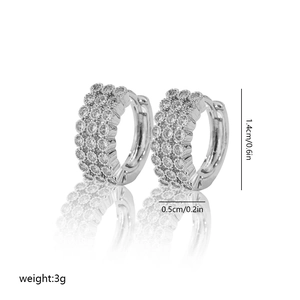 Detailed view of silver hoop earrings with dimensions 1.4cm height and 0.5cm width