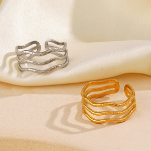 Golden and silver triple-layered wave rings with hammered texture and open design