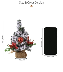Miniature snow-flocked Christmas tree detail with red balls and 20cm height reference