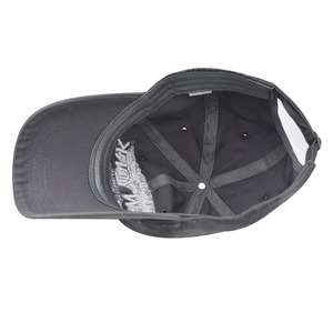 Detail of New York embroidery and adjustable metal buckle on distressed baseball cap