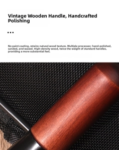 Close-up of premium unpainted red-brown wood handle with polished wax finish texture