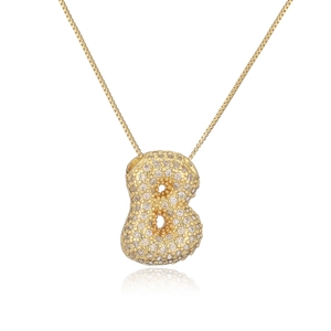 Close-up of gold-plated number 8 pendant with pave crystals on thin box chain necklace