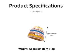 Detailed view of rainbow knitted beanie showing 22cm height and 112g weight specifications