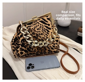 Leopard print shell bag with chunky gold chain and phone for size reference