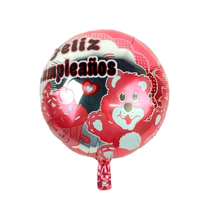 Detail of 18-inch silver and pink foil balloon with Feliz Cumpleaños and bear design