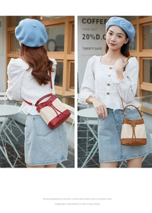 Detail of straw bucket bags with leather drawstring and adjustable shoulder straps