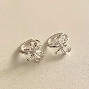 Minimalist 925 sterling silver butterfly hoop earrings with a sleek metallic finish