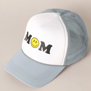 Light blue trucker hat with white front panel featuring MOM text and a yellow smiley face