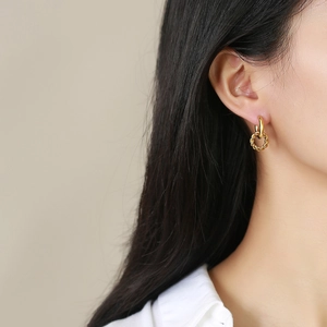 Golden interlocking twisted rope hoop earrings for women made of premium stainless steel