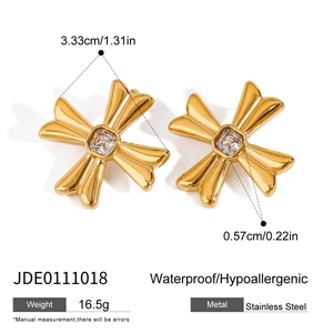 Detailed view of gold cross stud earrings with zircon inlay showing dimensions and weight