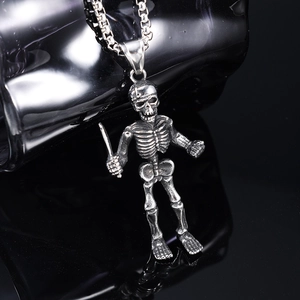 Punk style stainless steel reaper skull pendant necklace with silver finish on dark base