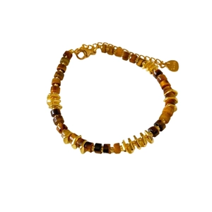 Tiger eye bead bracelet with irregular gold metal spacers and adjustable lobster clasp closure