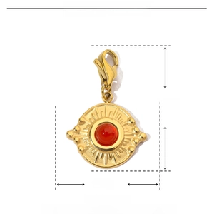 Technical dimensions of gold stainless steel sun pendant with red natural stone inlay