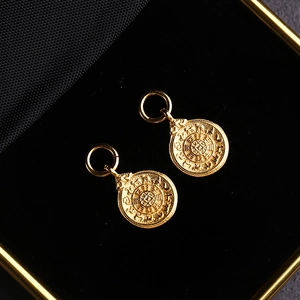 Pair of S925 sterling silver gold-plated round coin pendants with embossed relief patterns