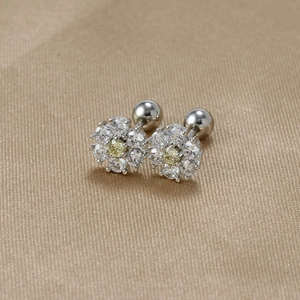 Detailed view of the S925 silver flower stud earring with screw back and yellow zircon