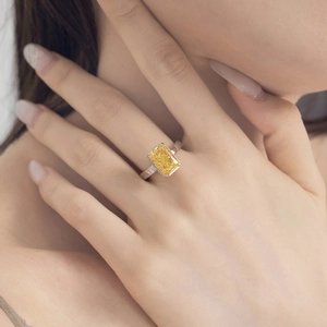 Macro detail of French S925 silver ring featuring a yellow rectangular ice-cut zircon gem