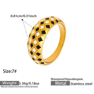 Detail view of gold-plated stainless steel ring showing 0.81cm width and checkerboard pattern