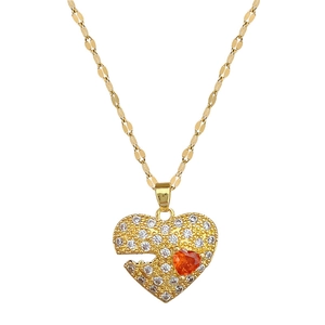 Titanium steel heart necklace with clear crystals and a vibrant orange gemstone pendant