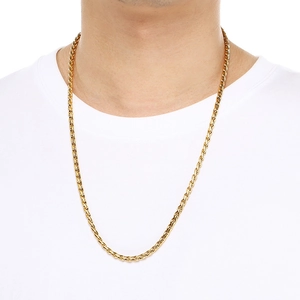 Men's 18k gold plated stainless steel dragon link chain worn on model's neck