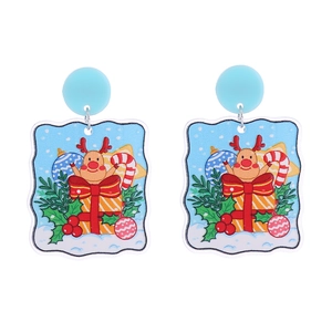 Close-up of reindeer pattern on square glitter acrylic Christmas tree earrings