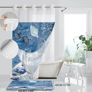 Close-up of ocean-themed shower curtain texture and matching bath mat details