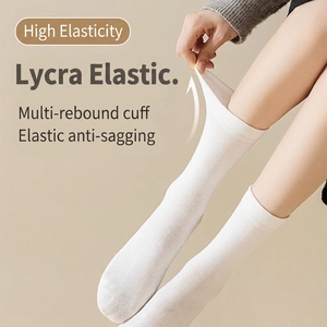 White combed cotton crew socks with Lycra elastic cuff for high stretch and comfort