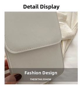 Close-up of white lychee grain faux leather texture and neat stitching on mobile phone bag