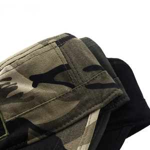 Macro shot of durable camouflage and black canvas caps with neat double-row stitching detail