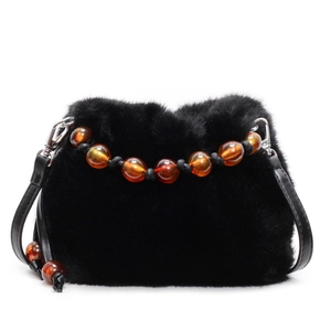 Chic black faux fur bucket bag with amber resin bead handle and leather strap