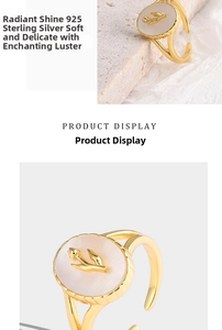 Detailed view of S925 sterling silver tulip ring with an oval shell inlay and gold finish