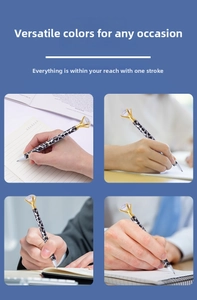 Close-up of leopard print metal ballpoint pen with large diamond top for writing