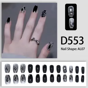 Press-on nails D553 in black and silver glitter with 3D crystal accents and AL07 shape