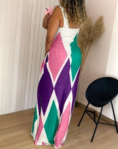 Close-up of geometric color block pattern on a sleeveless summer slit maxi dress
