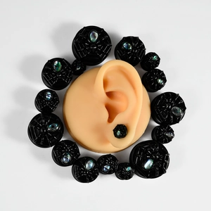 Spider web stainless steel ear tunnels with abalone shell inlay in various sizes