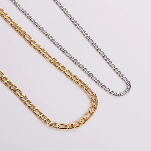 Classic silver and golden stainless steel Figaro chain necklaces in a minimalist style