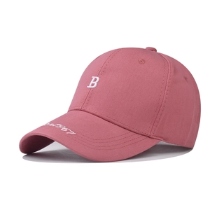 Detail of pink cotton baseball cap with white embroidered B and since 1967 text