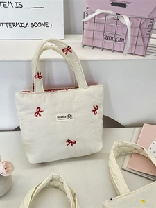 Elegant Korean style quilted canvas tote bag featuring delicate red bow embroidery