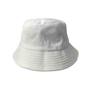 Minimalist white terry cloth bucket hat with woven texture for autumn and winter style