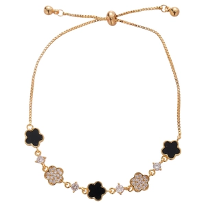 Adjustable gold pull-chain bracelet with black enamel and zircon clover charms