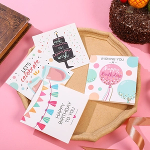 Set of four cute birthday greeting cards with envelopes and colorful party illustrations