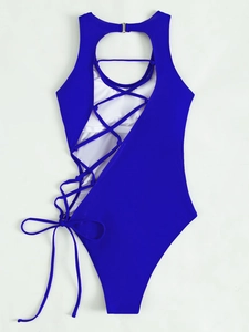 Detail of royal blue one-piece swimsuit featuring side criss-cross lace-up hollow design