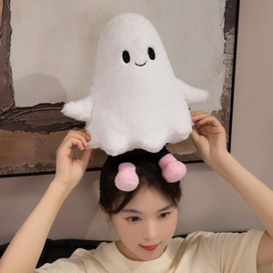 Detailed close-up of a white plush ghost hair accessory with soft long fur and pink feet
